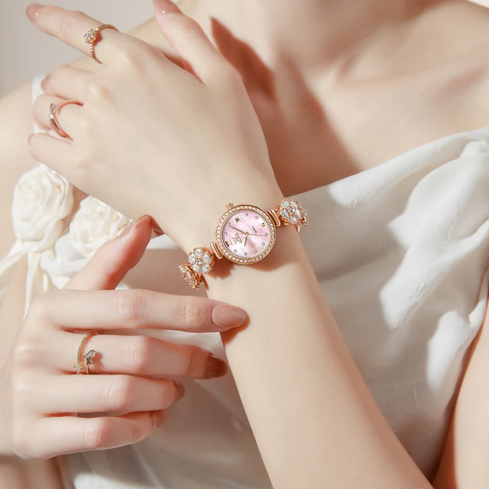 OLEVS Women Spinning Flower Watch Peach Blossom Crystal Mother of Pearl Date Quartz 5638