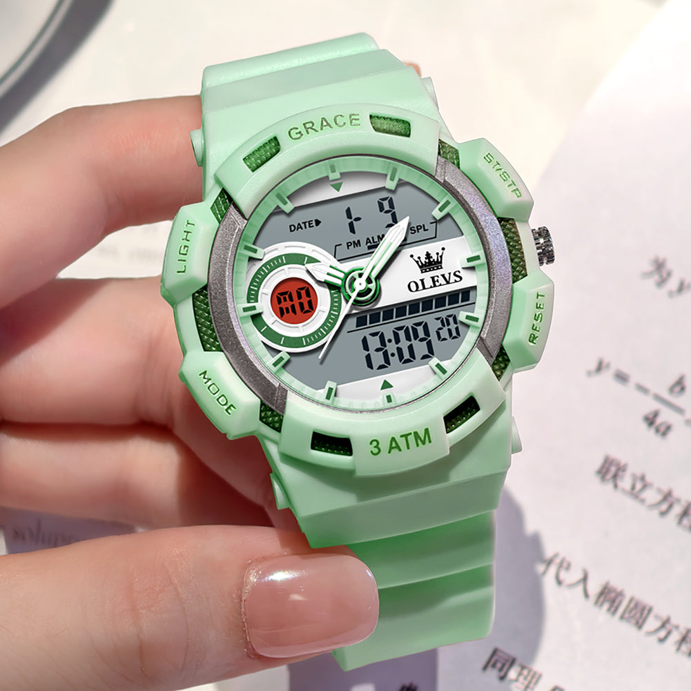 OLEVS 1121 mint green dial and side button close up