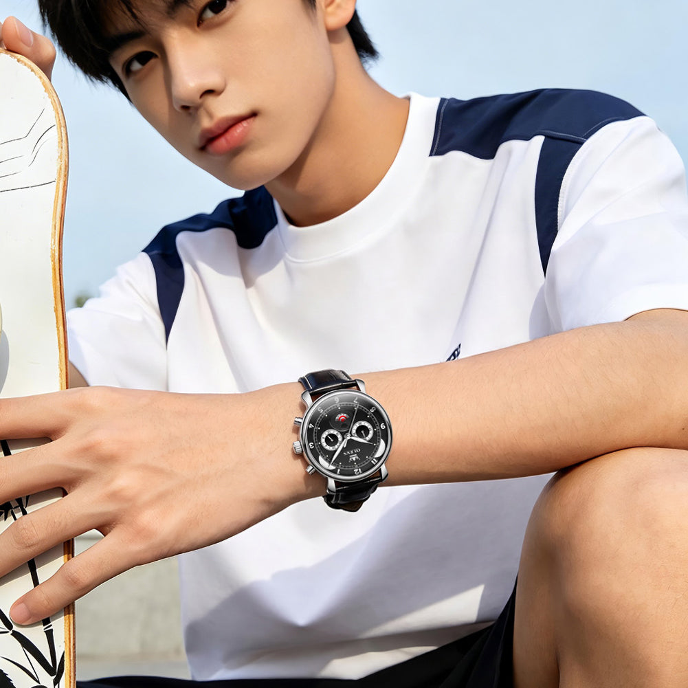 OLEVS 3753 black dial watch on wrist