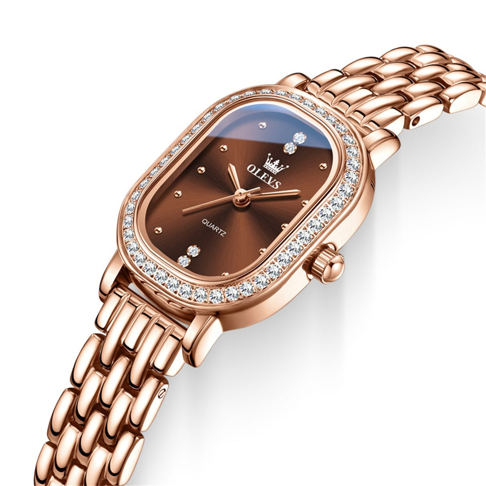 OLEVS 5697 Rose gold tone steel bracelet and brown dial closeup