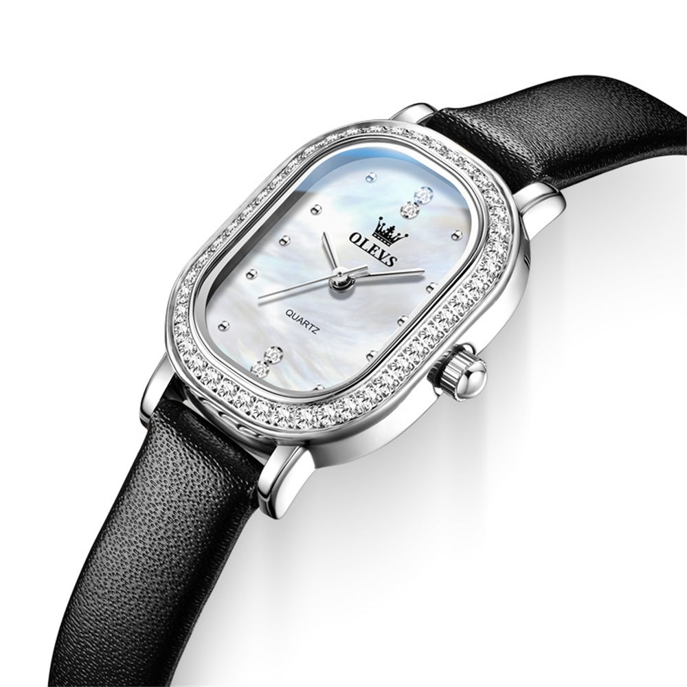 OLEVS 5697 Black leather strap and silver white dial closeup