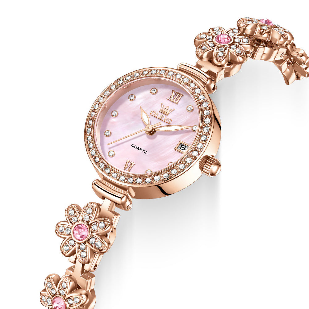 OLEVS 5699 pink dial and sparkling floral bracelet close up