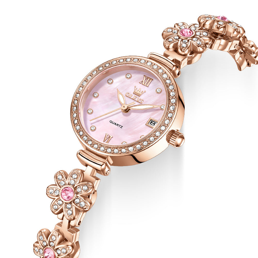 OLEVS 5699 pink dial and sparkling floral bracelet close up