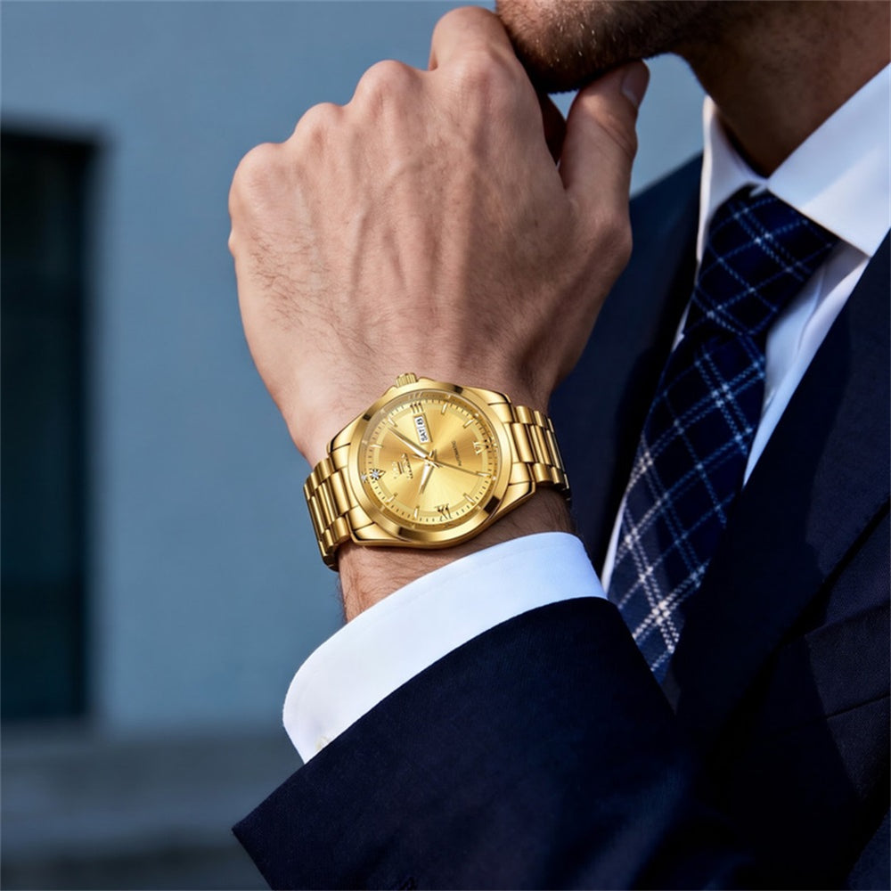 OLEVS 7099 all gold watch worn with business suit