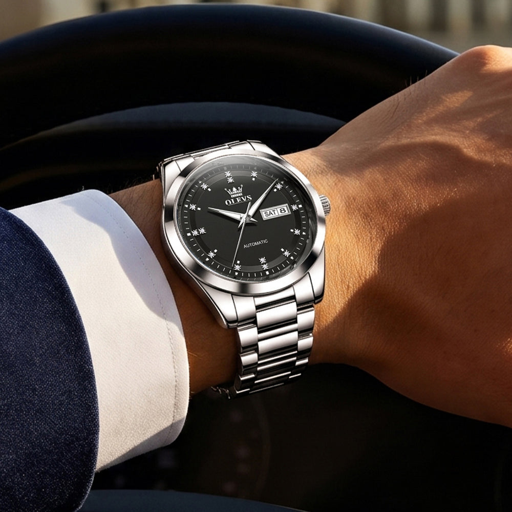OLEVS 7136 Silver Black watch worn with business attire