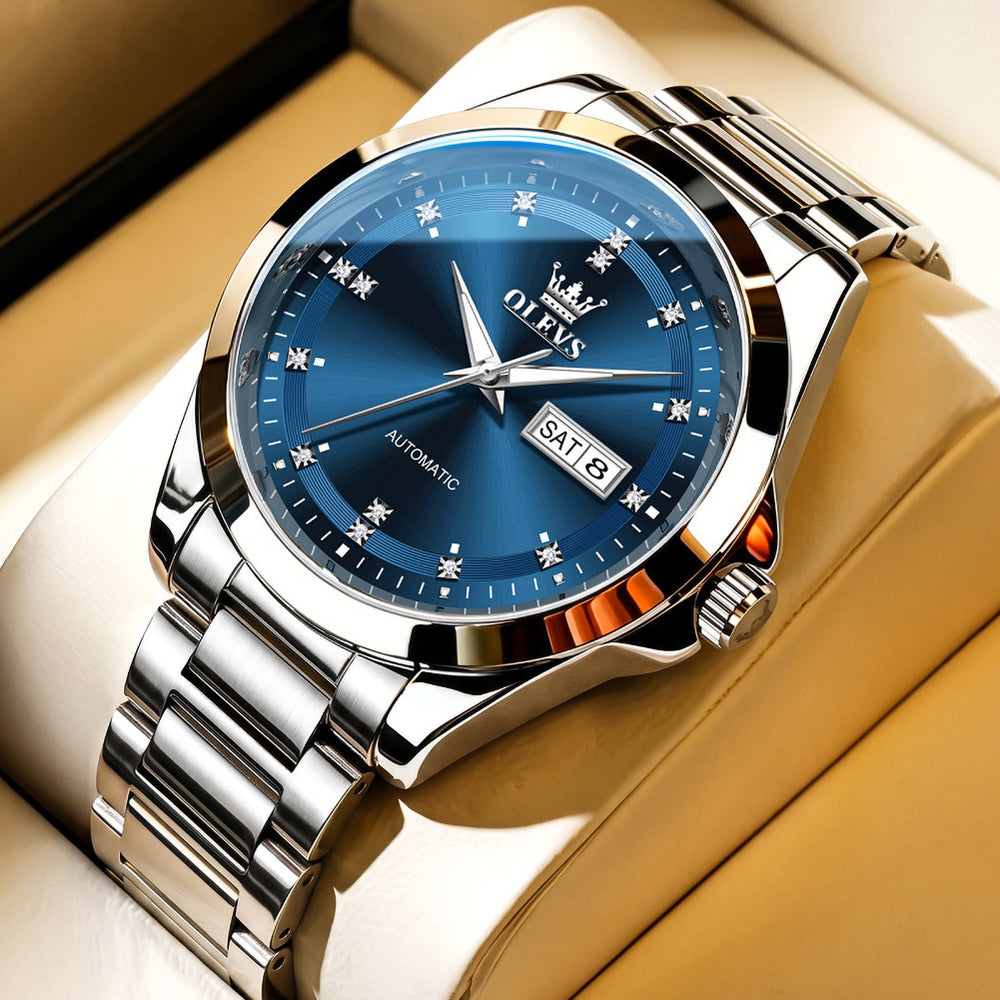 OLEVS 7136 Silver Blue watch studio closeup