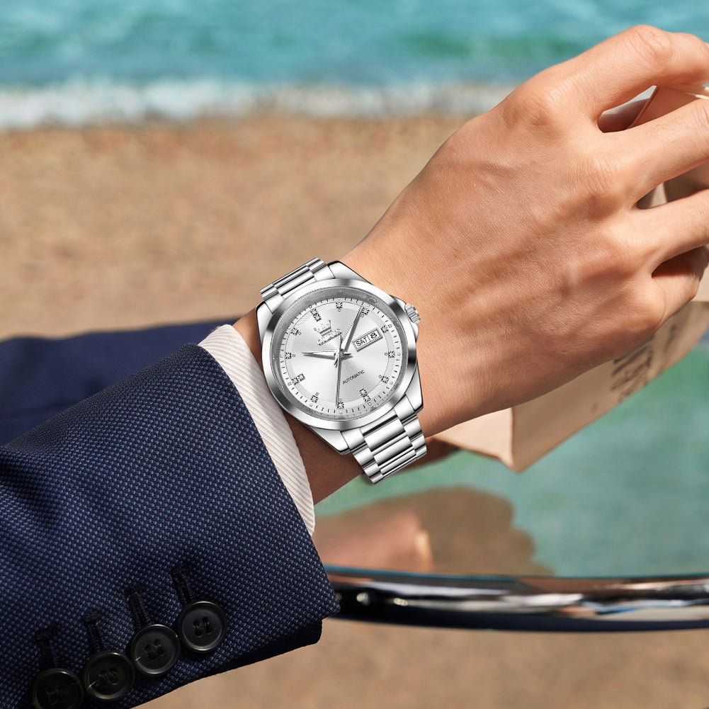 OLEVS 7136 Silver White watch worn on wrist