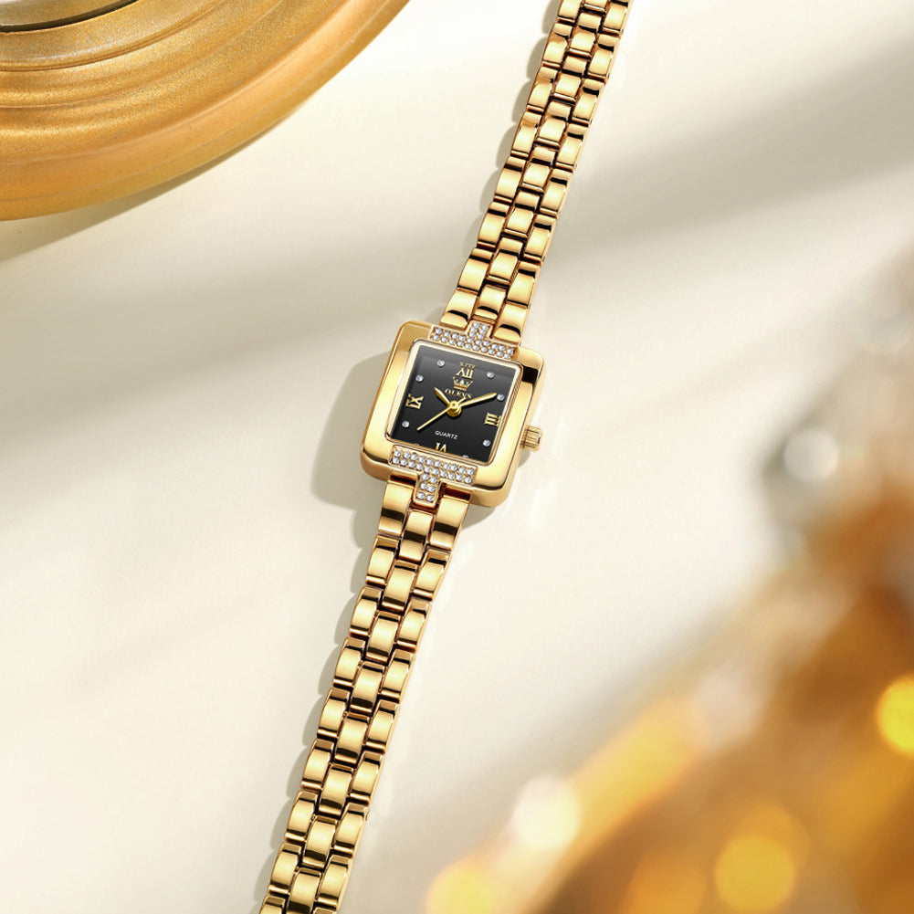 Rear view of OLEVS 7141 gold tone stainless steel bracelet and case back