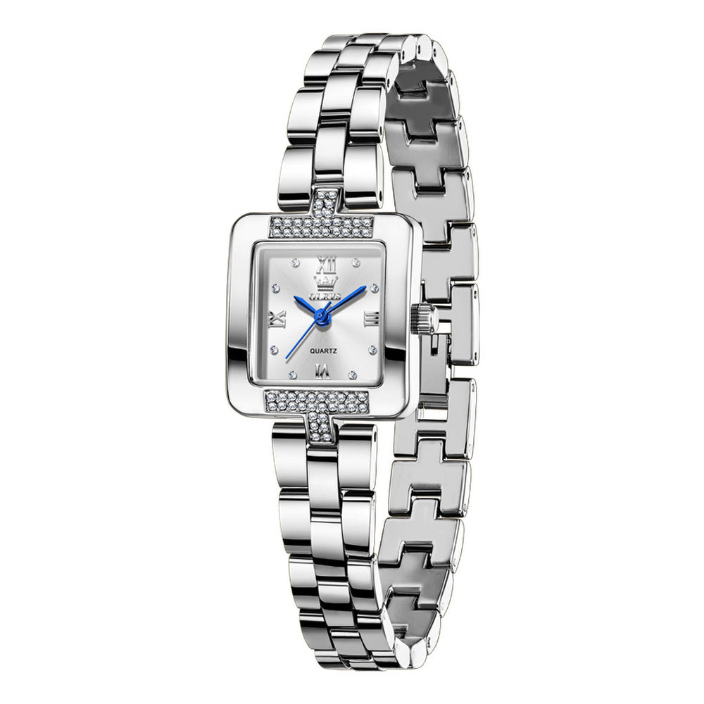 Front view of OLEVS 7141 silver women's watch with white dial