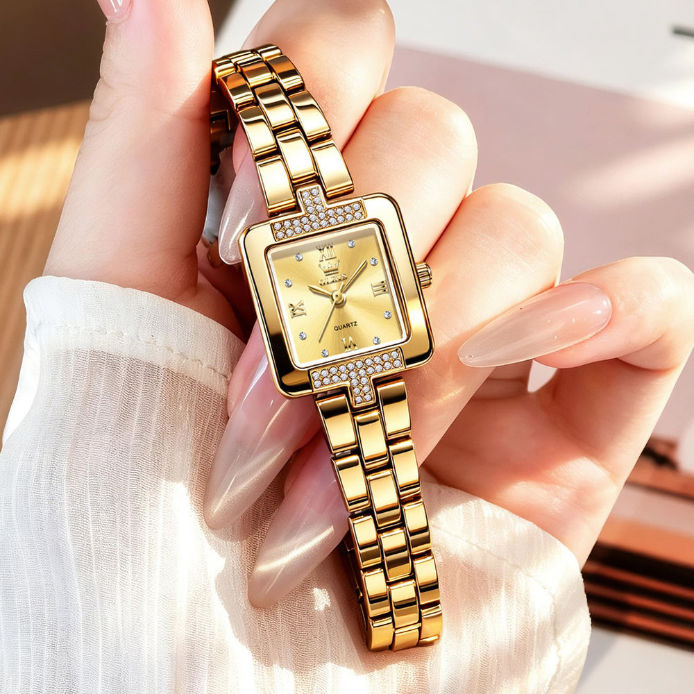 OLEVS 7141 square quartz watch worn on a woman's wrist