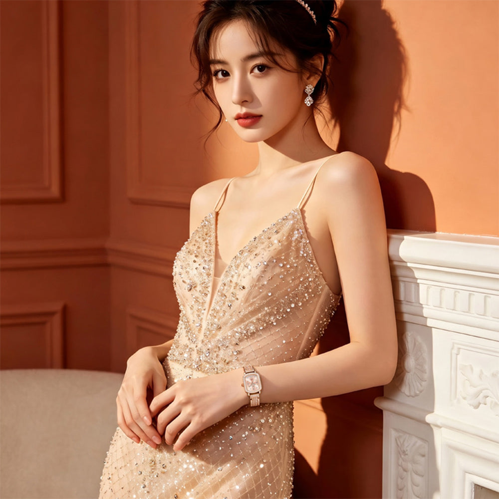 OLEVS 7142 women's jewelry watch styled with formal evening wear